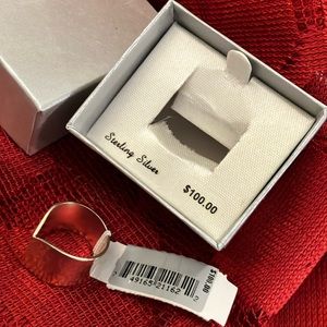 Ladies, new beautiful sterling silver ring, size 7, retail value, 100